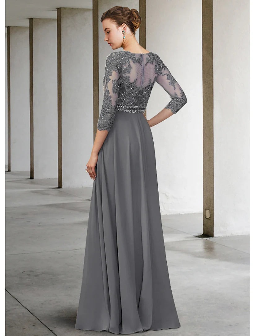 Close-up of V-neckline and lace appliques on formal dress.