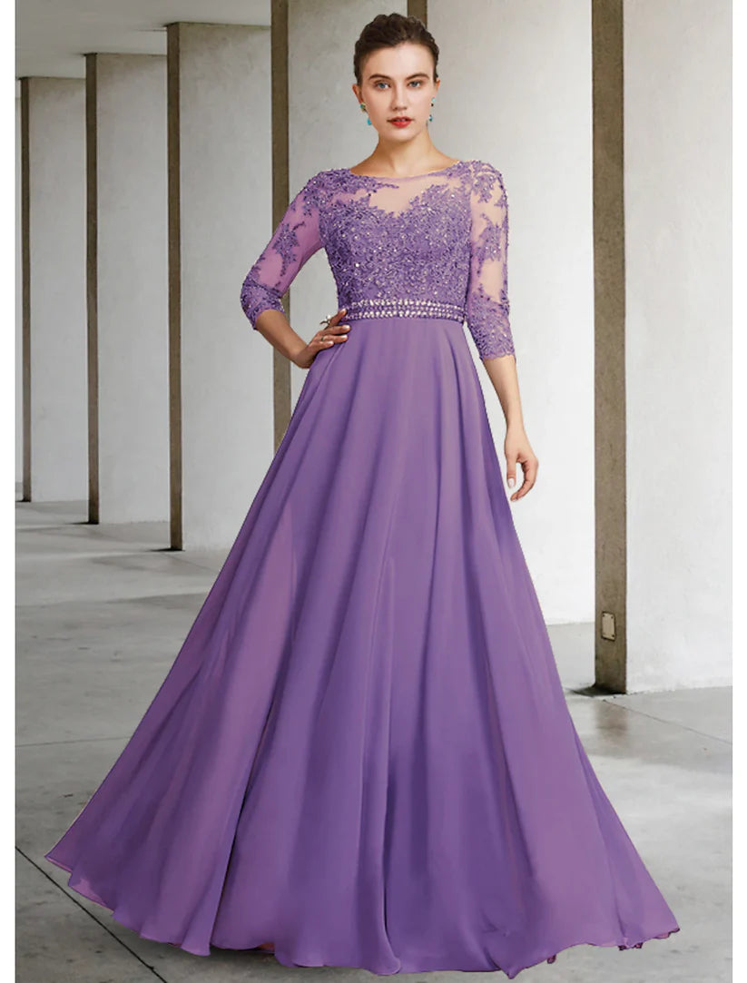 Woman posing in A-line Mother of the Bride dress.