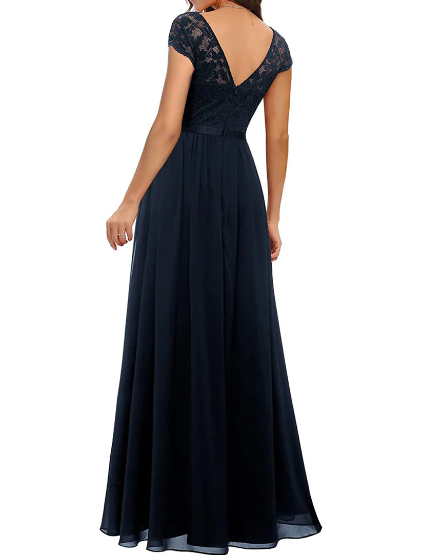 Back view of A-Line chiffon lace gown with short sleeves and pleats.