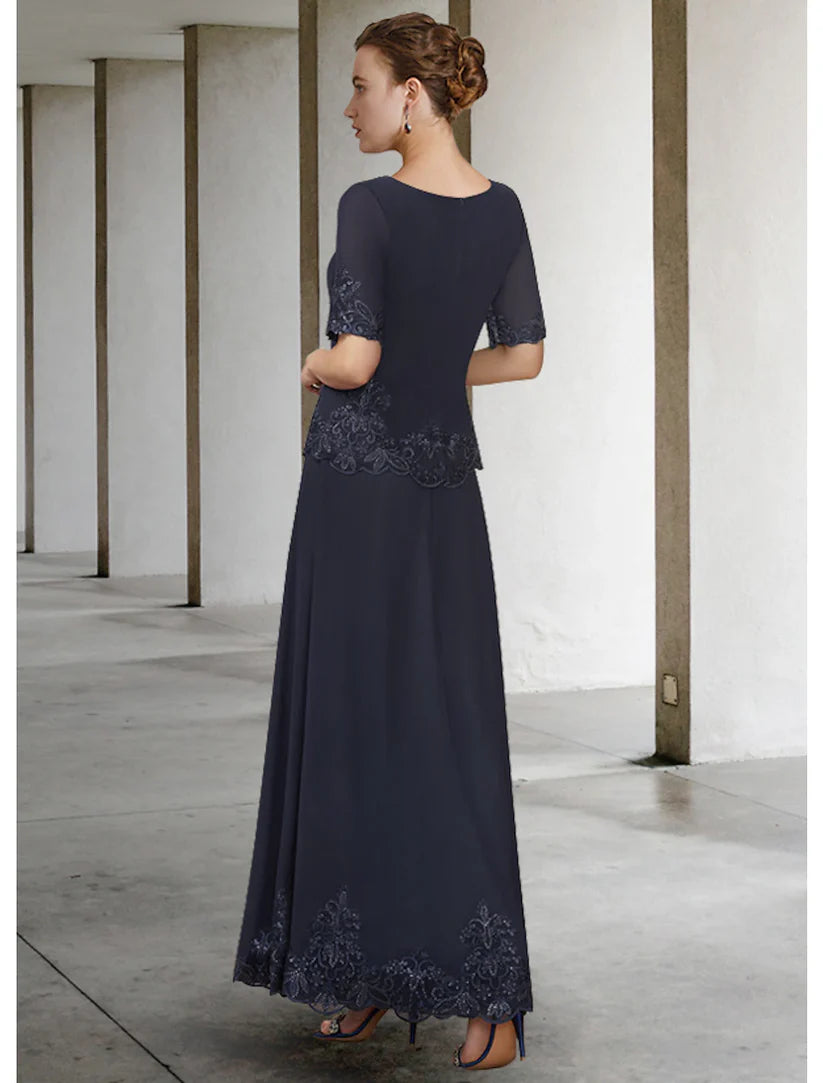 A-Line Mother of the Bride dress featuring a V-neck, short sleeves, and intricate lace details.