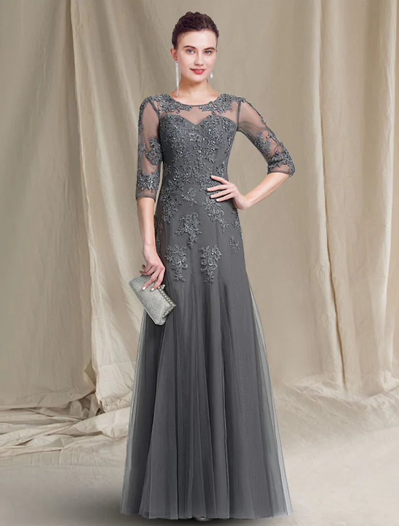 Elegant A-Line Mother of the Bride dress with V-neck, lace, and 3/4 sleeves.
