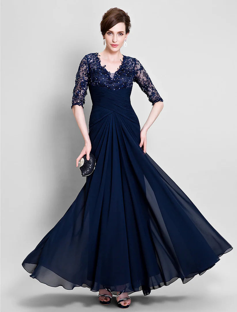 Elegant A-Line Mother of the Bride dress with V-neck and half sleeves, featuring chiffon and lace with beading.