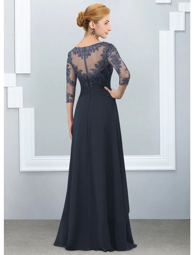 Detail of the half sleeve and jewel neck on an elegant formal dress.