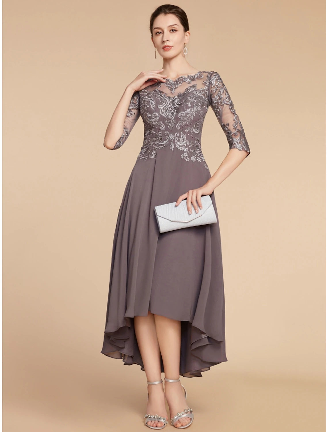 Elegant A-line mother of the bride dress with scoop neck and half sleeves.