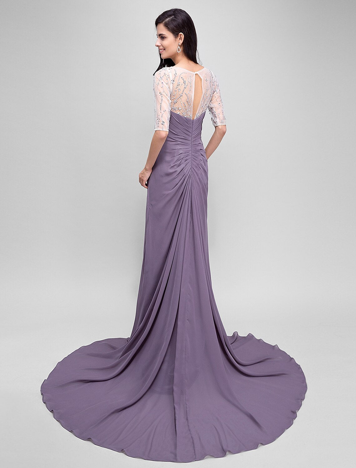 Back view of the A-line chiffon dress showing criss-cross beading.