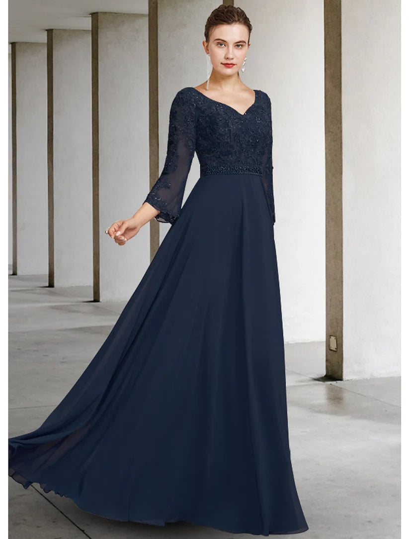 Elegant A-line mother of the bride dress with V-neck, 3/4 sleeves, and lace appliques.