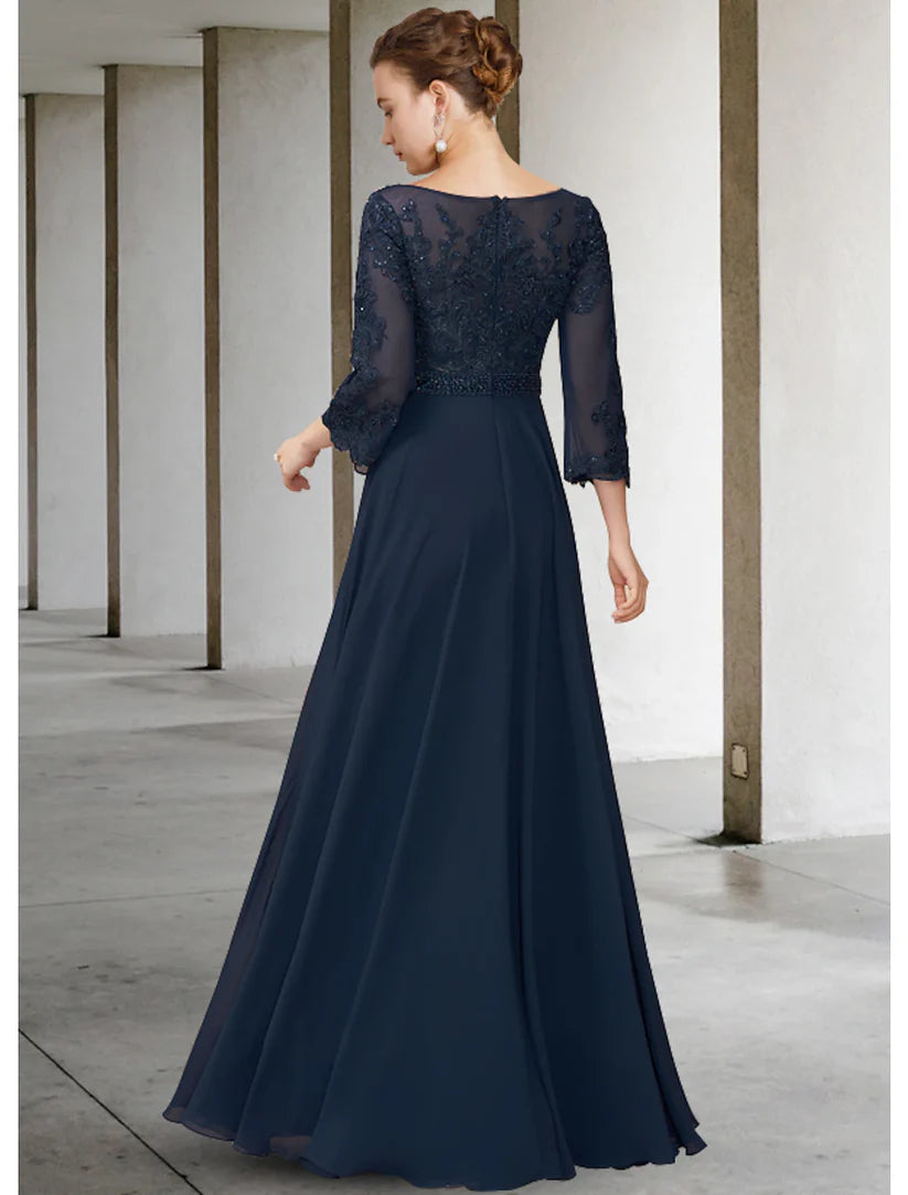 Back view of the A-line mother of the bride dress showing chiffon lace and floor-length design.