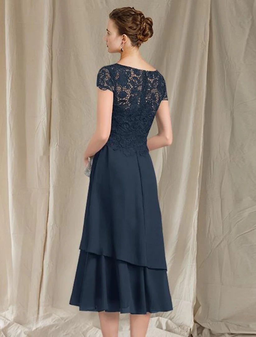 Full length view of the A-line V-neck chiffon lace dress, featuring ruffled short sleeves and ankle length.