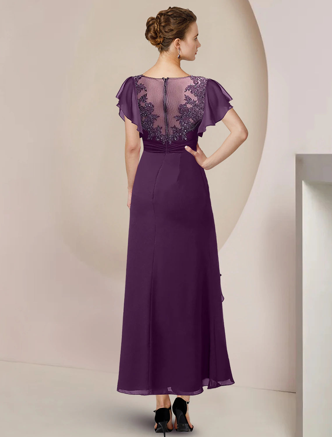 Side view of the tea length formal dress, highlighting chiffon and beading.