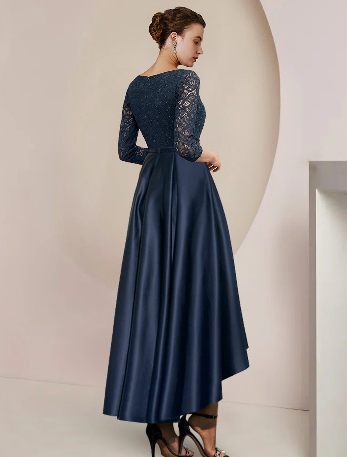 Close-up of satin and lace fabric with subtle beading on the A-Line dress.