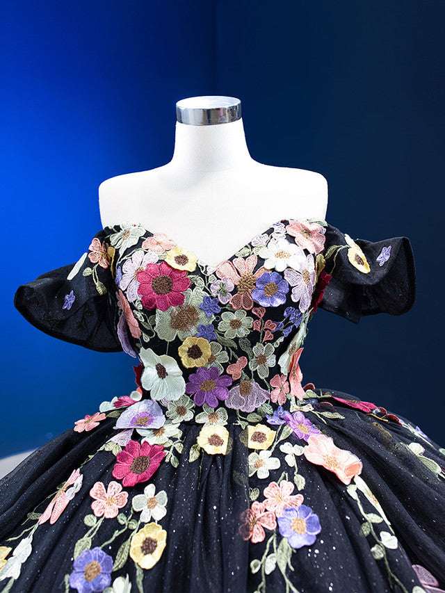 Back view of the A-line off-shoulder prom dress showcasing the tulle skirt.