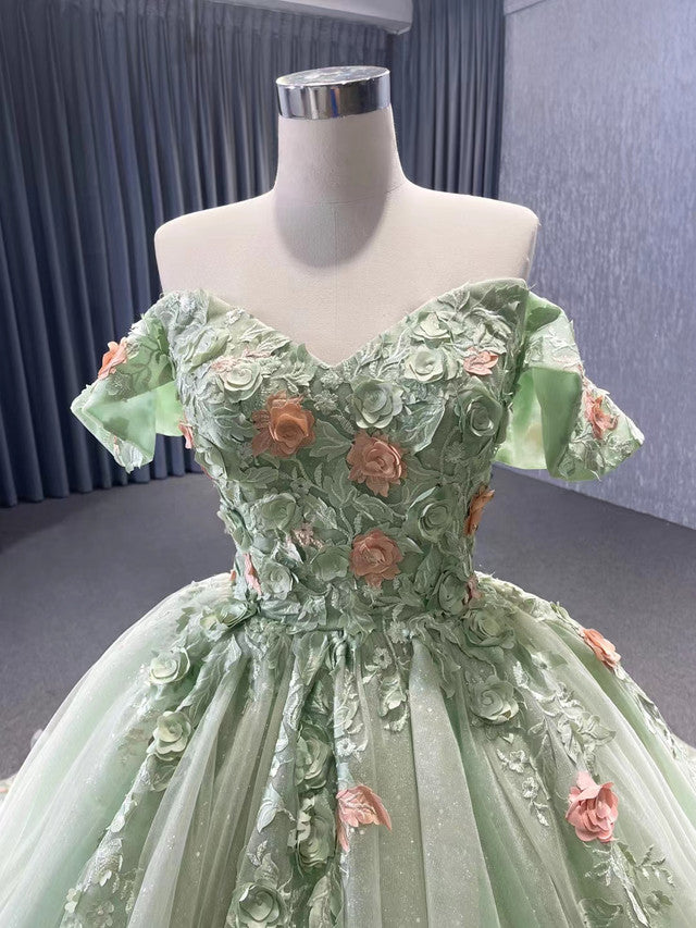 Side view of the off-shoulder A-line prom dress with 3D flowers.