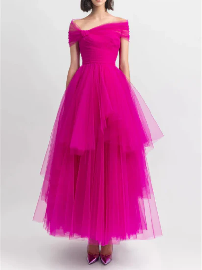 Woman wearing an elegant A-line off-shoulder ankle-length evening dress.