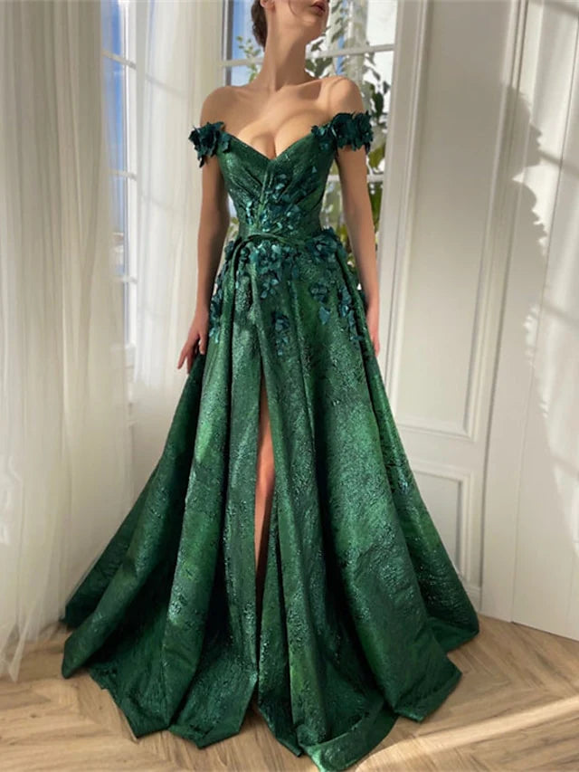 Side profile of the floor-length A-line prom dress, showcasing appliques.