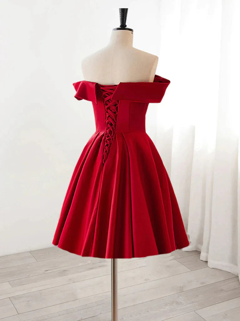 Side view of the short satin prom dress featuring appliques.
