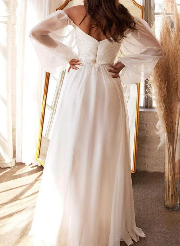 Back view of A-line off-shoulder wedding gown.