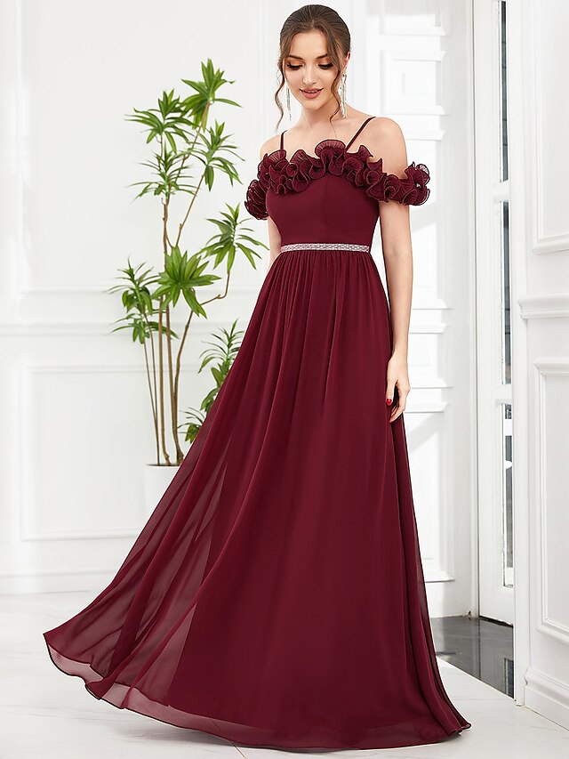 Back view of the floor-length A-line prom dress.