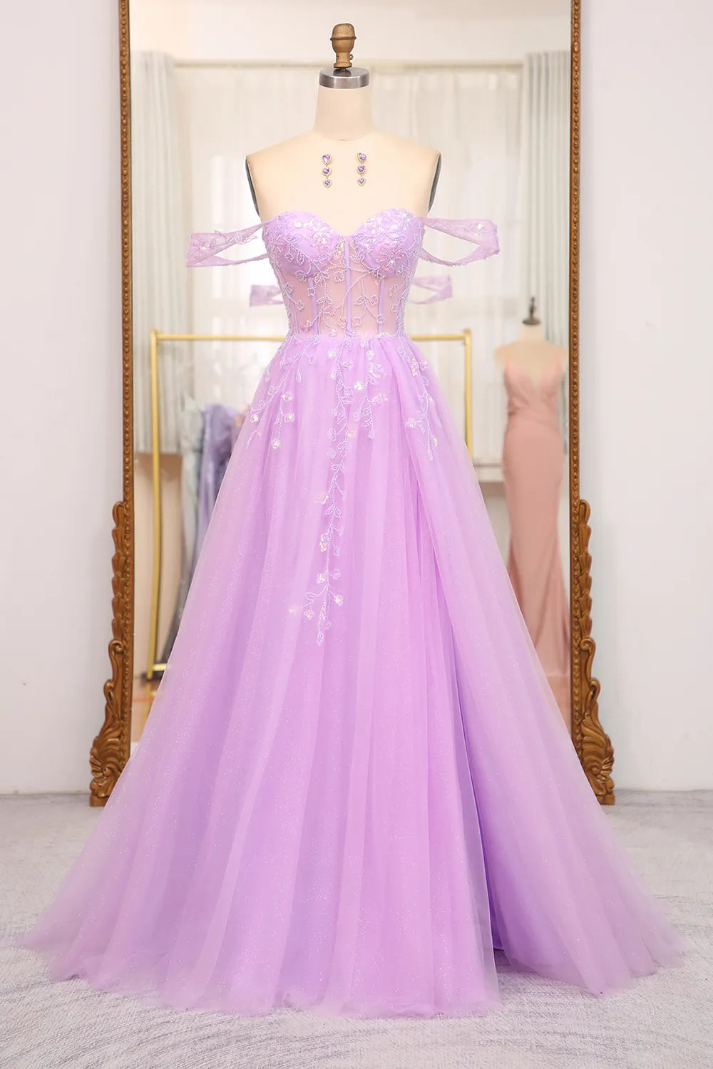 Elegant A-line off-shoulder prom dress with corset bodice and beading.