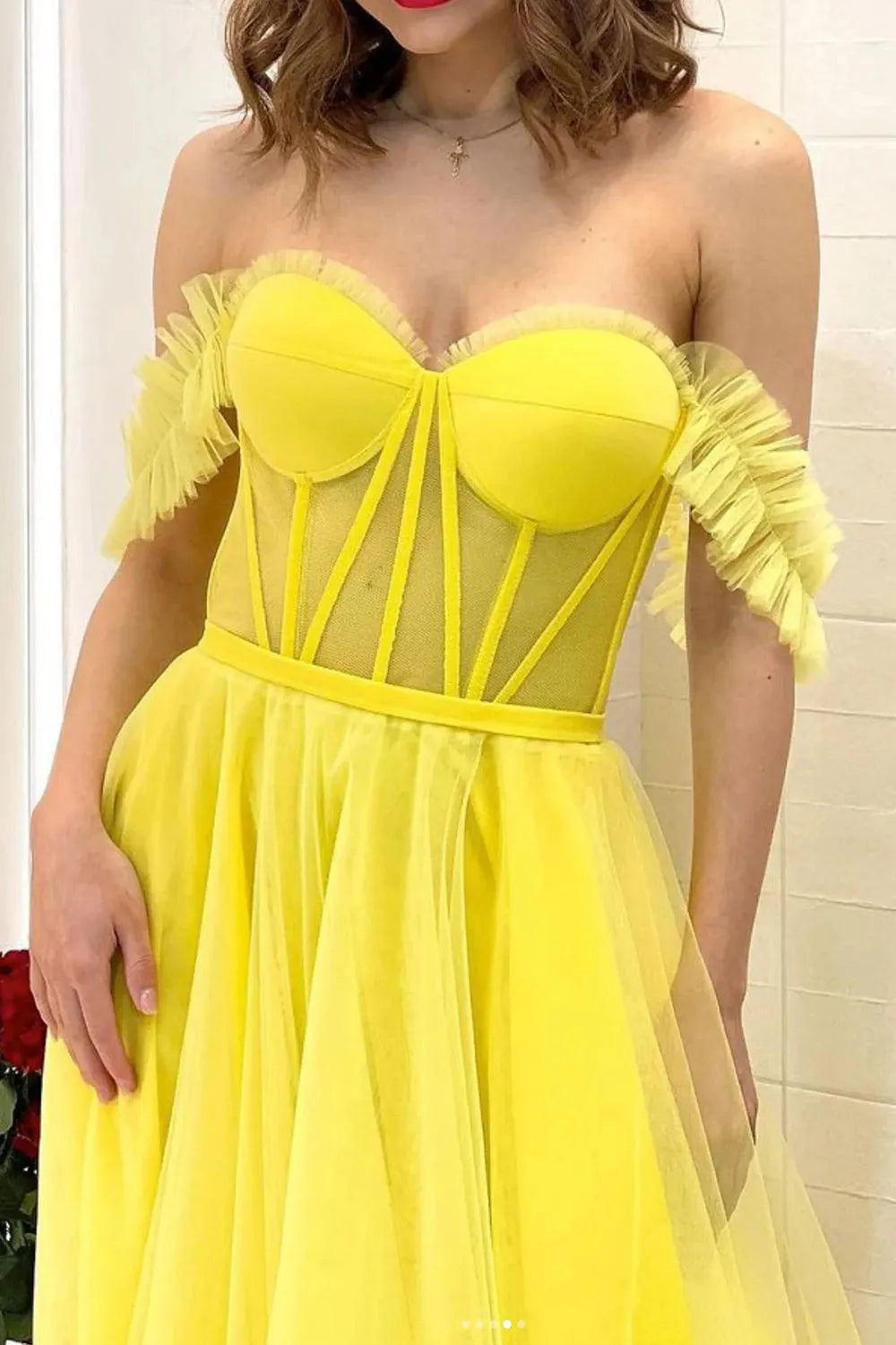 Detail of the corset bodice on the off-shoulder prom dress.