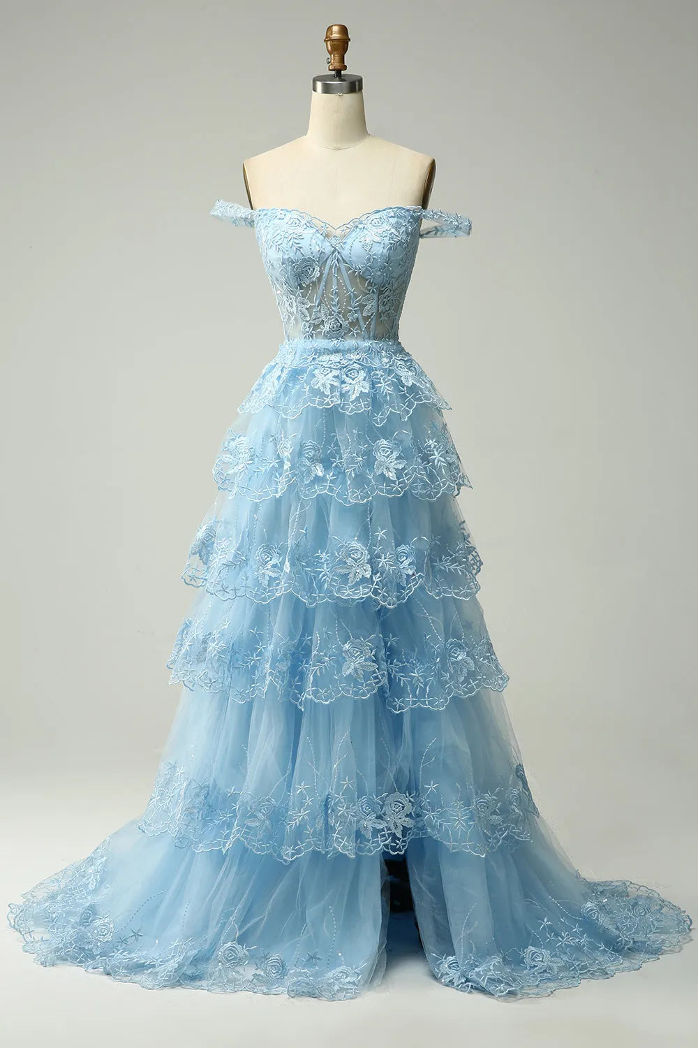 Full length view of the off-shoulder A-line prom dress.