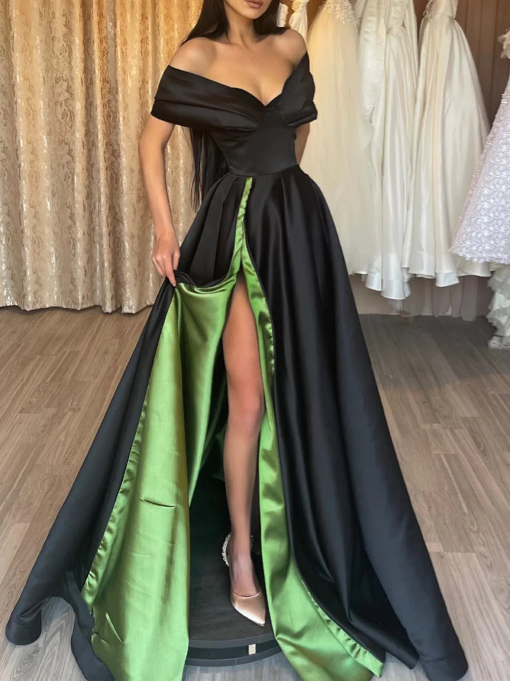 Elegant A-Line off-shoulder floor length prom dress, front view.