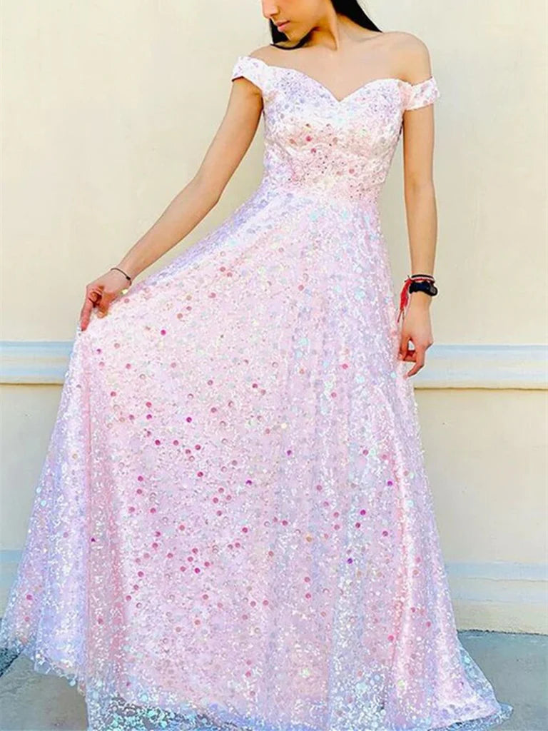 Woman wearing an elegant off-shoulder A-line lace floral long prom dress.