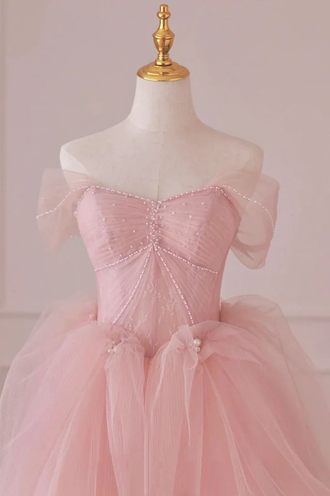 Back view of the off-shoulder lace tulle long dress, showcasing the skirt.