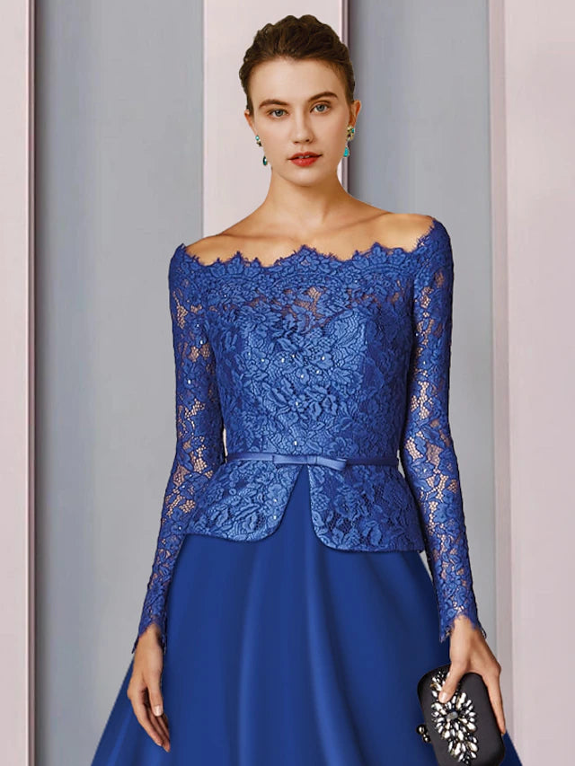 A-Line Mother of the Bride dress with tea length skirt and delicate bow details.