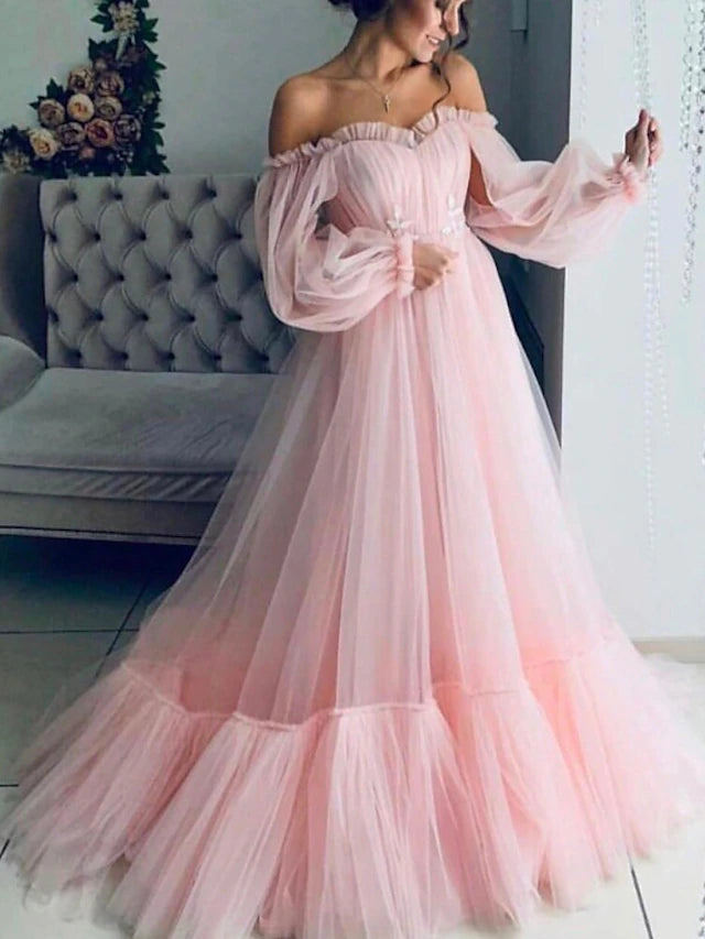 Full view of the minimalist A-line off-shoulder long sleeve engagement dress.