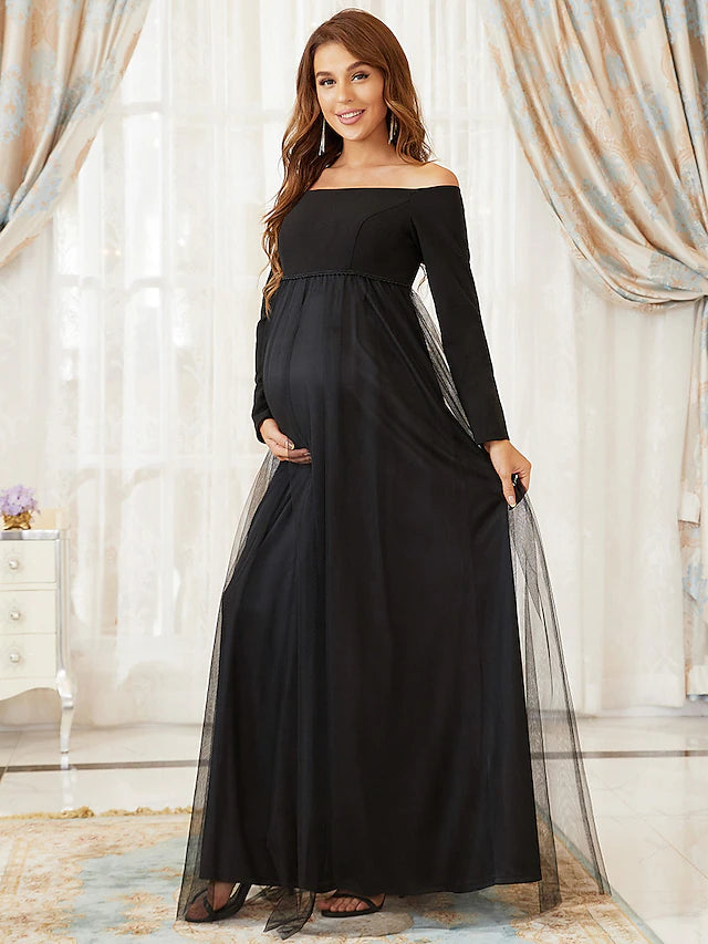 Side view of the elegant A-line off-shoulder dress, highlighting the long tulle sleeves.
