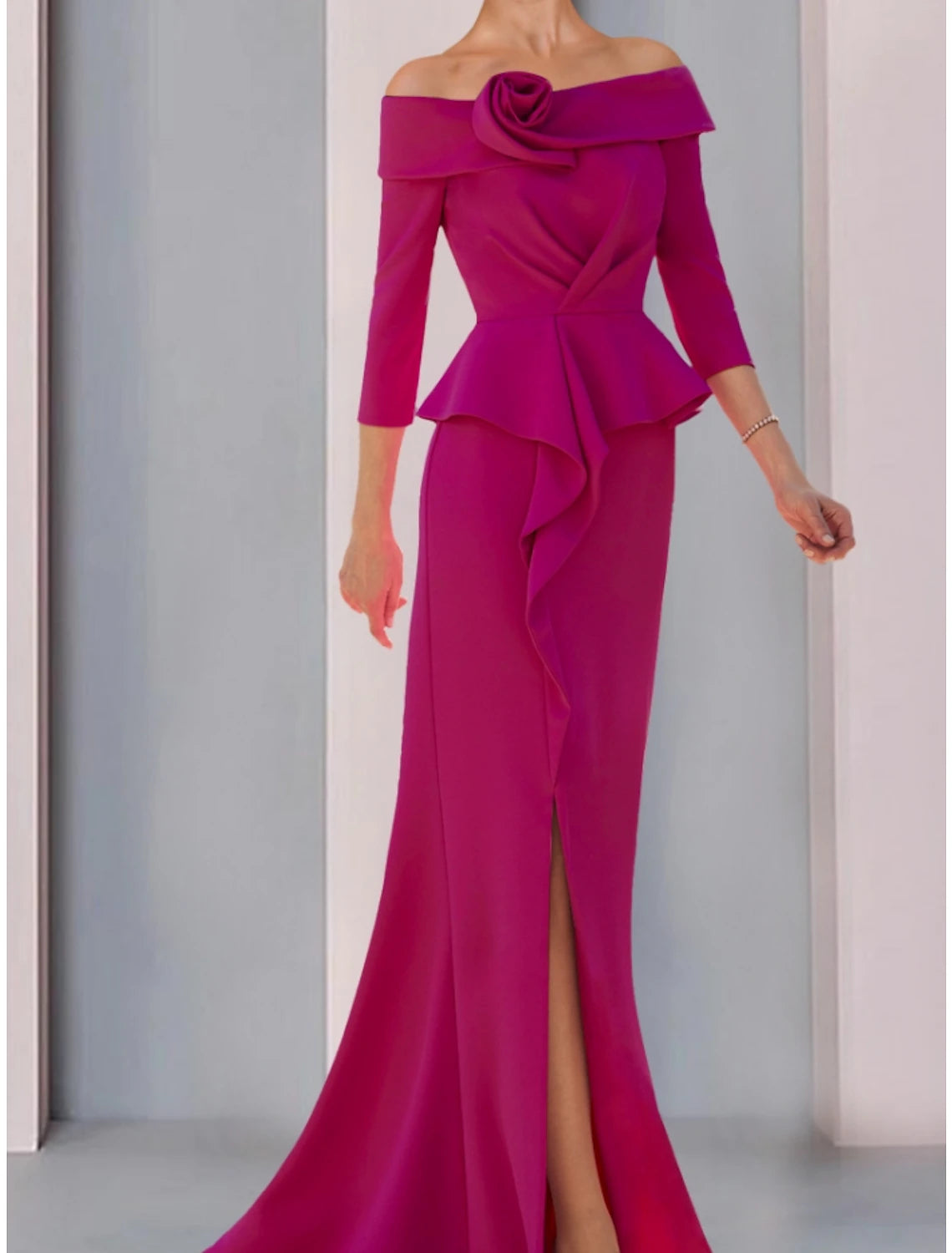 Back view of the A-line mother of the bride dress with sweep train.
