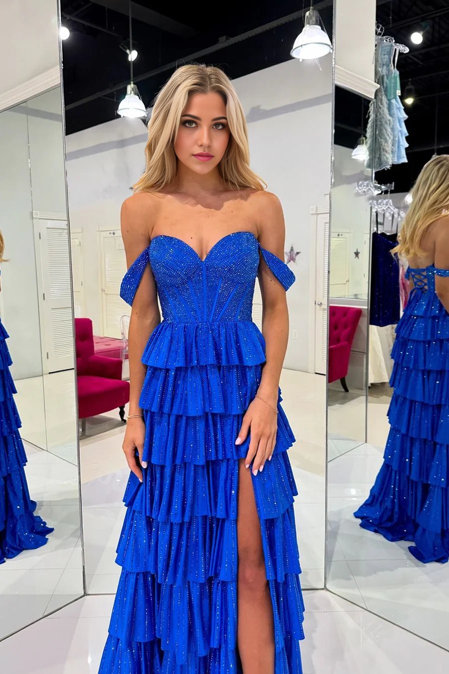 Back view of the royal blue off-shoulder A-line prom dress.