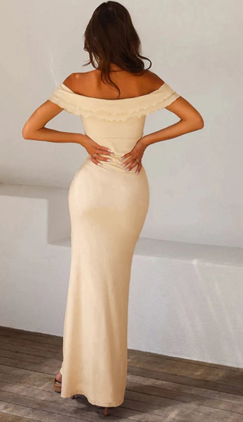 Back view of the formal off-shoulder dress.