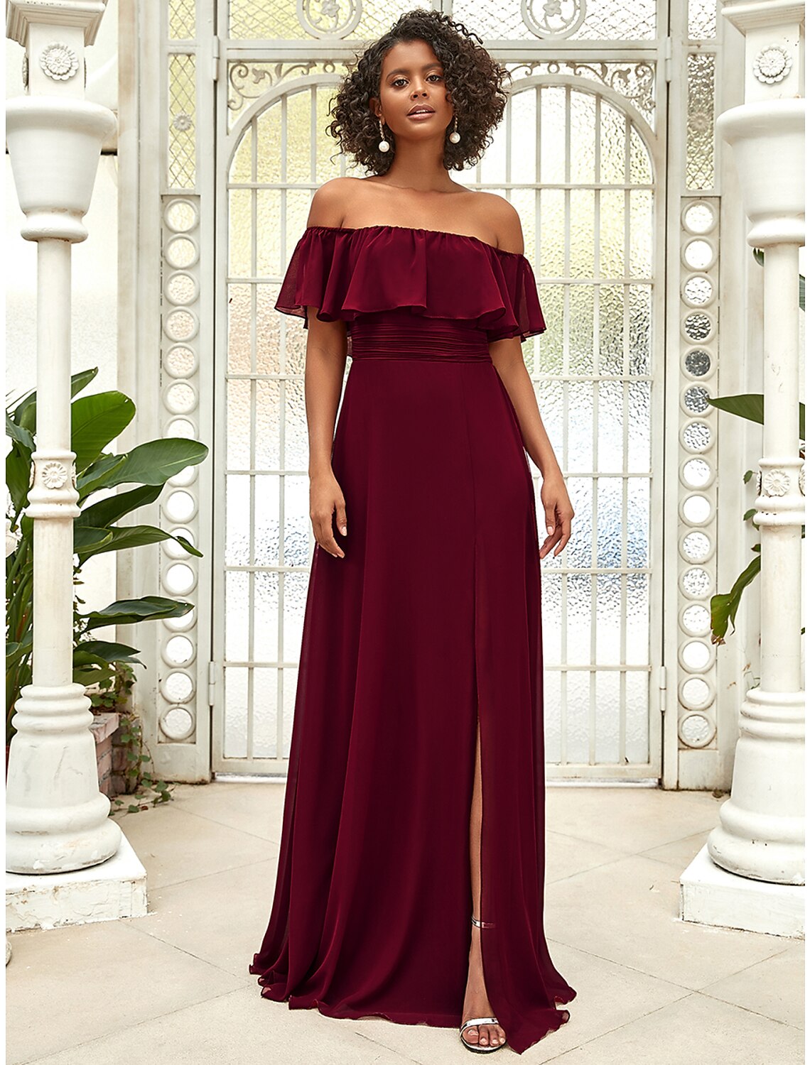 Elegant A-line off-shoulder chiffon bridesmaid dress with ruffles and draping.