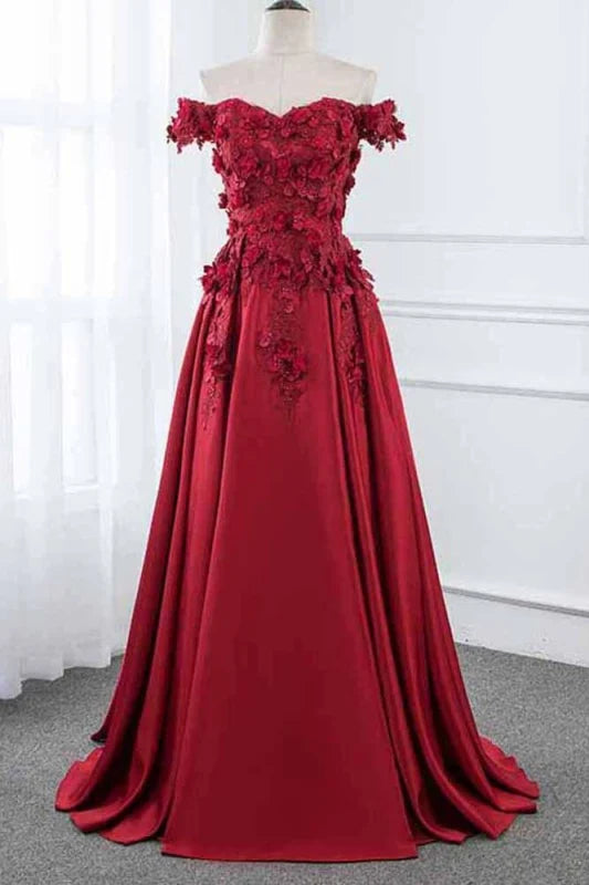 Elegant A-line off-shoulder satin prom dress with lace floral details.