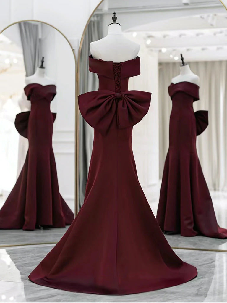 Back view of the long satin off-shoulder prom dress.