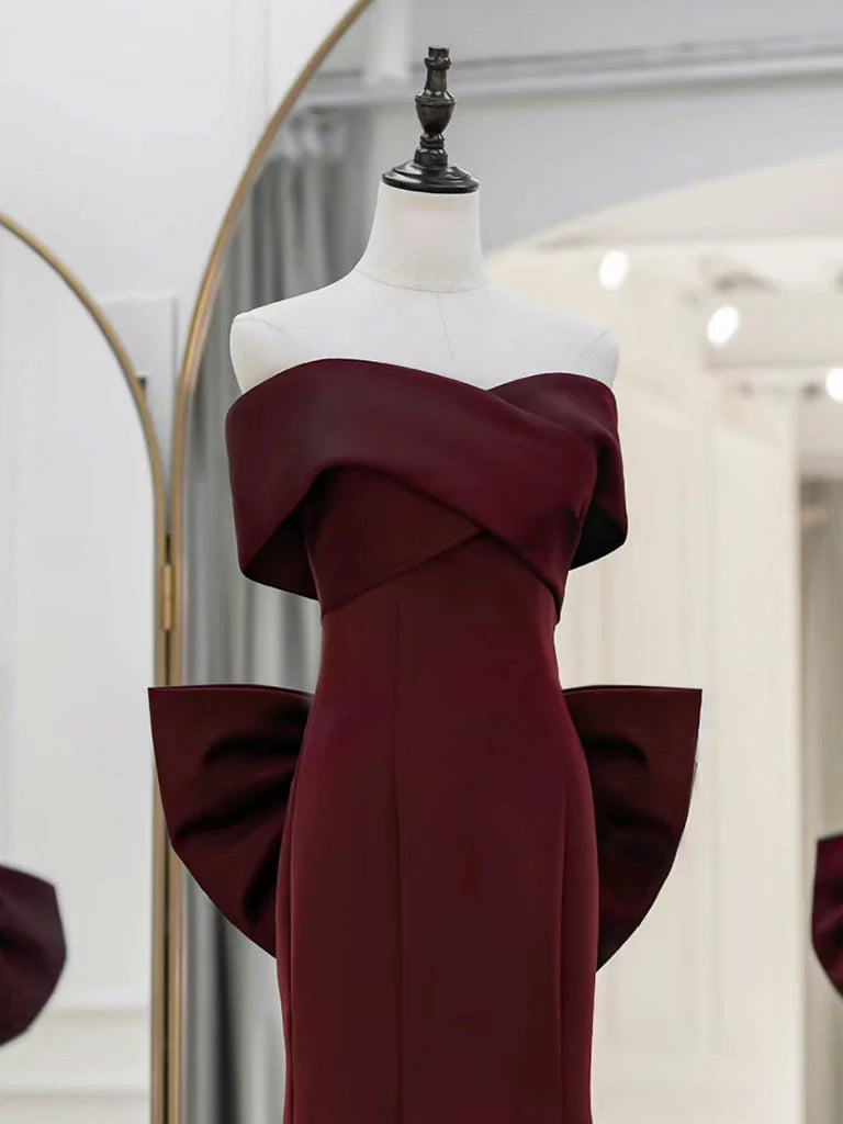 Close-up of the satin fabric on the off-shoulder prom dress.
