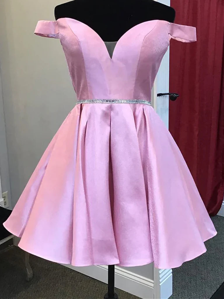 Woman wearing an elegant off-shoulder satin A-line homecoming dress.
