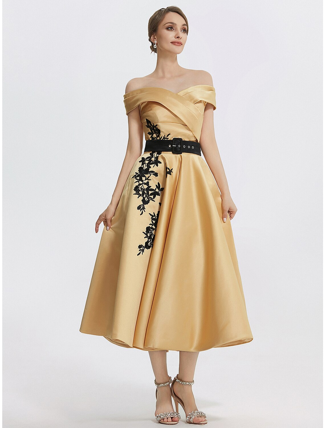 Side profile of the elegant A-line off-shoulder satin dress.