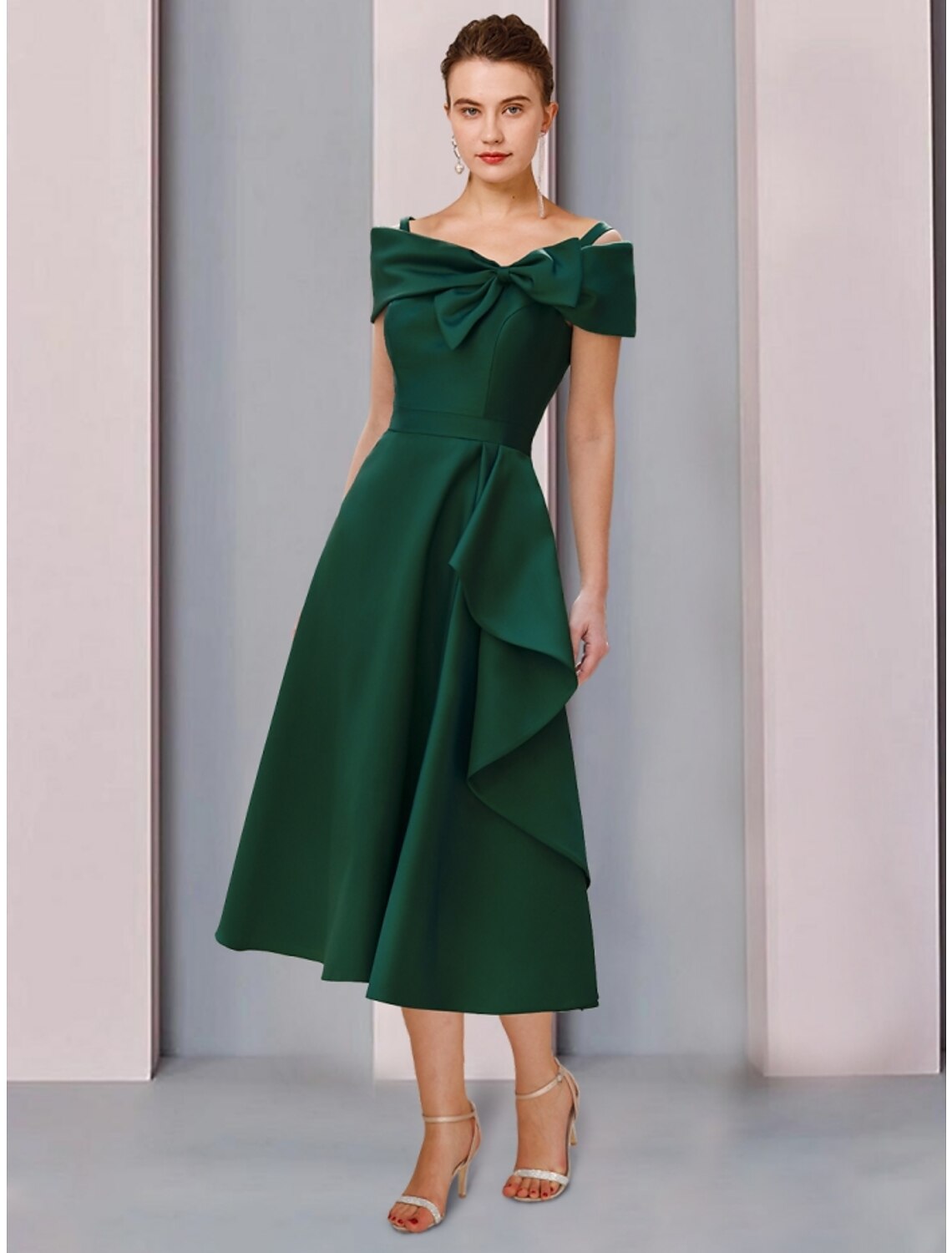 Elegant A-line off-shoulder satin tea-length dress with short sleeves, bows, ruffles, and ruching.