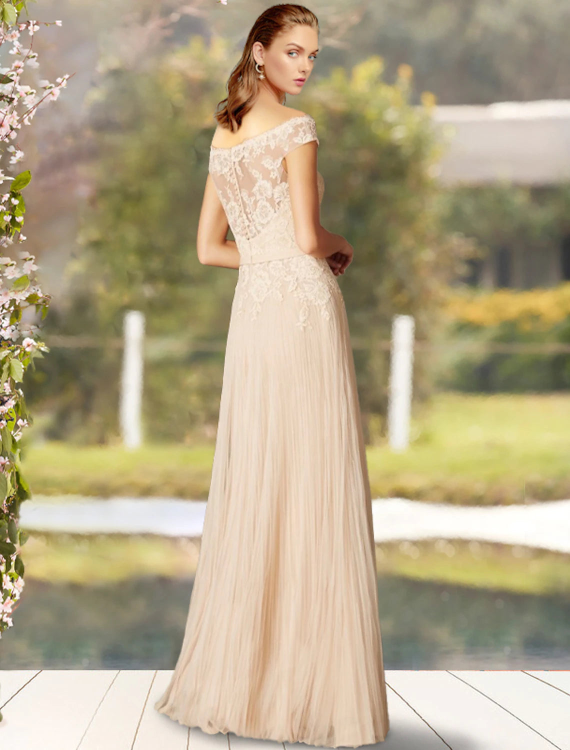 Side view of the A-line off-shoulder Mother of the Bride dress, showcasing pleats and bow details.