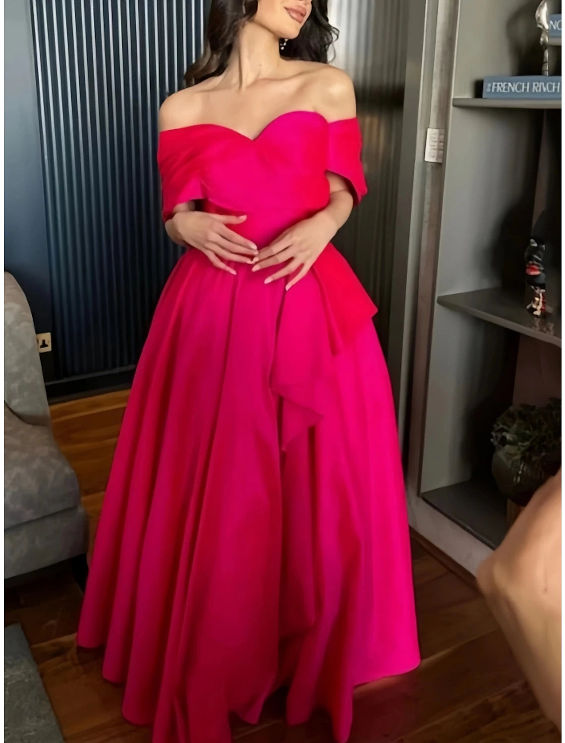 Elegant A-line off-shoulder satin evening gown in red.