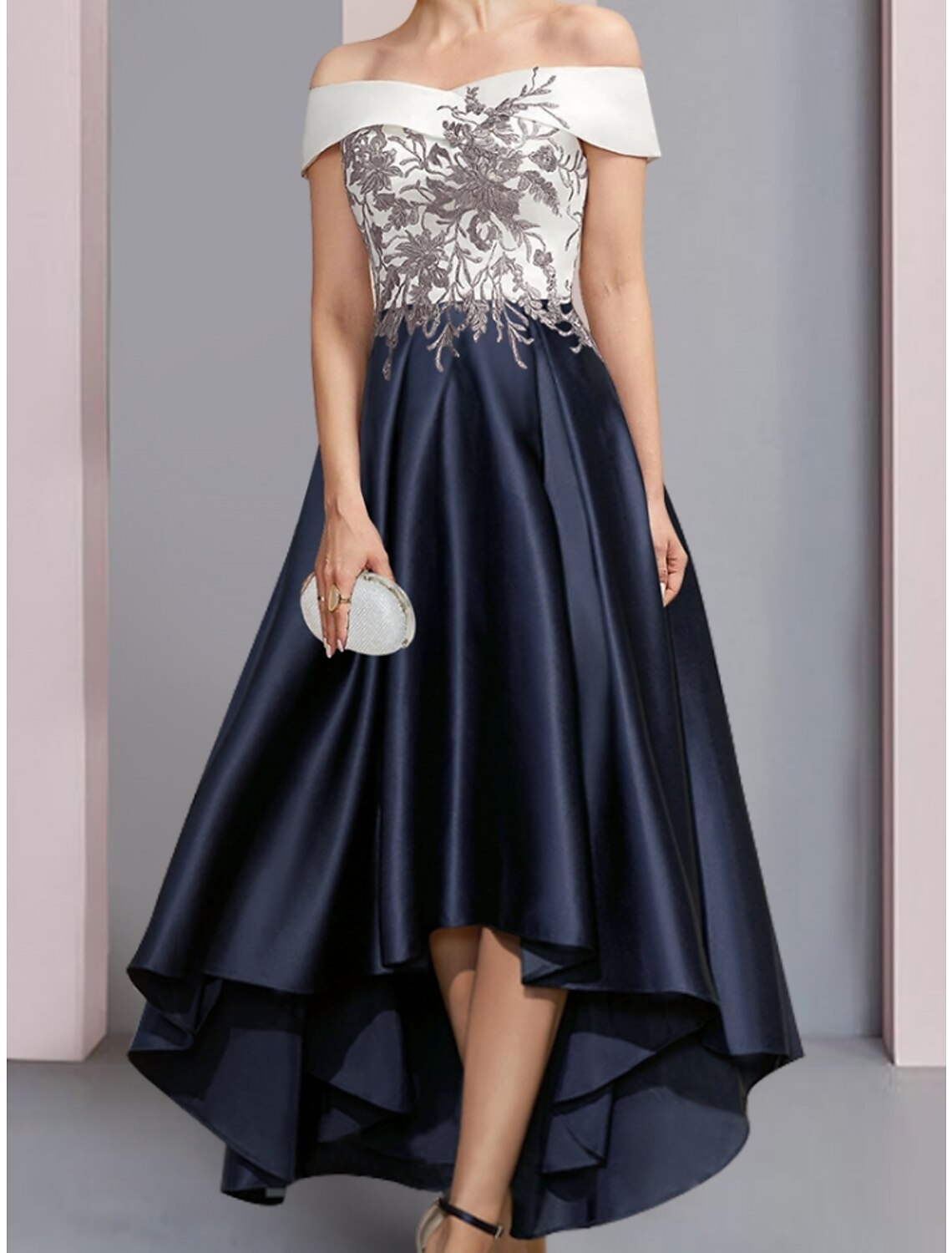 Back view of the asymmetrical ankle-length satin lace wedding guest dress.