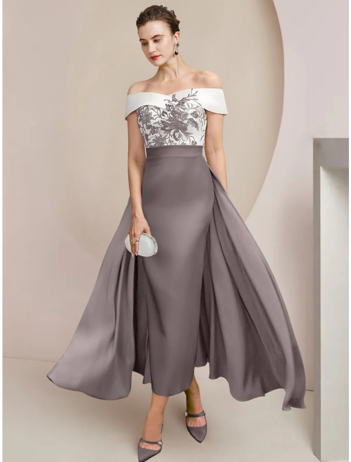 Elegant A-Line off-shoulder Mother of the Bride dress with appliques and ruching.