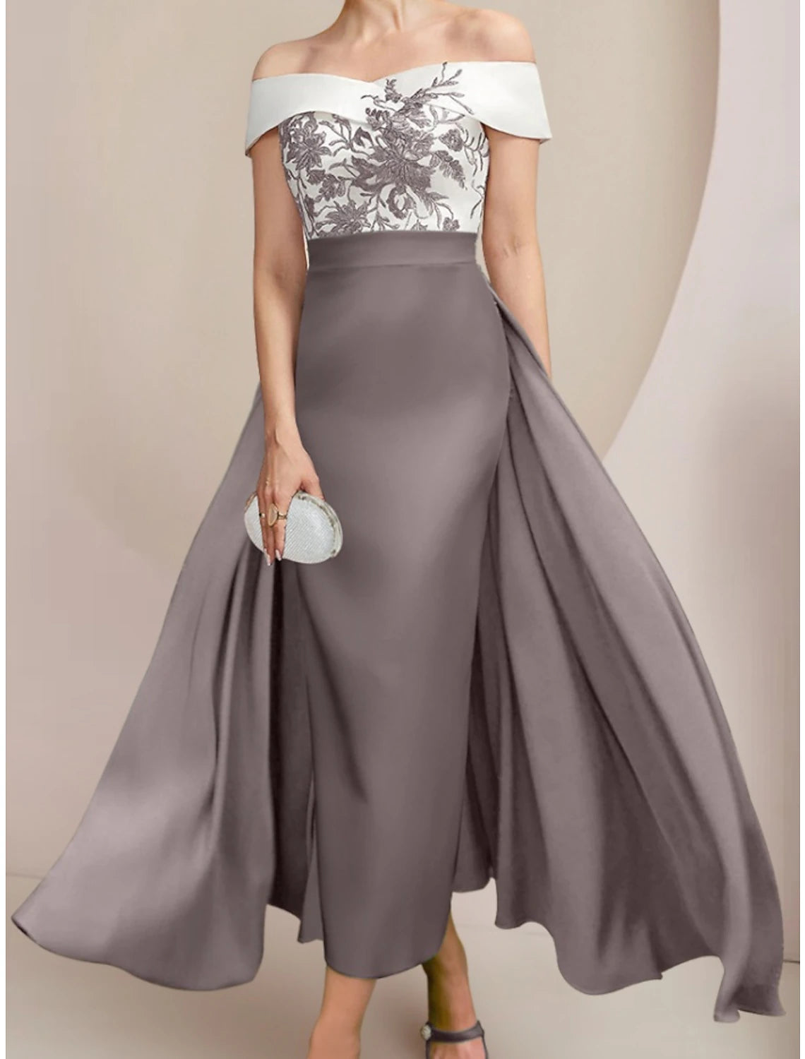 Back view of the elegant A-Line Mother of the Bride gown with short sleeves.