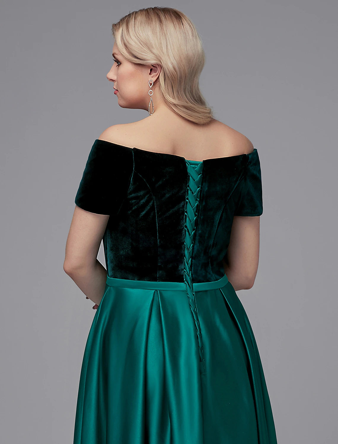 Detailed view of the off-shoulder neckline and short sleeves.