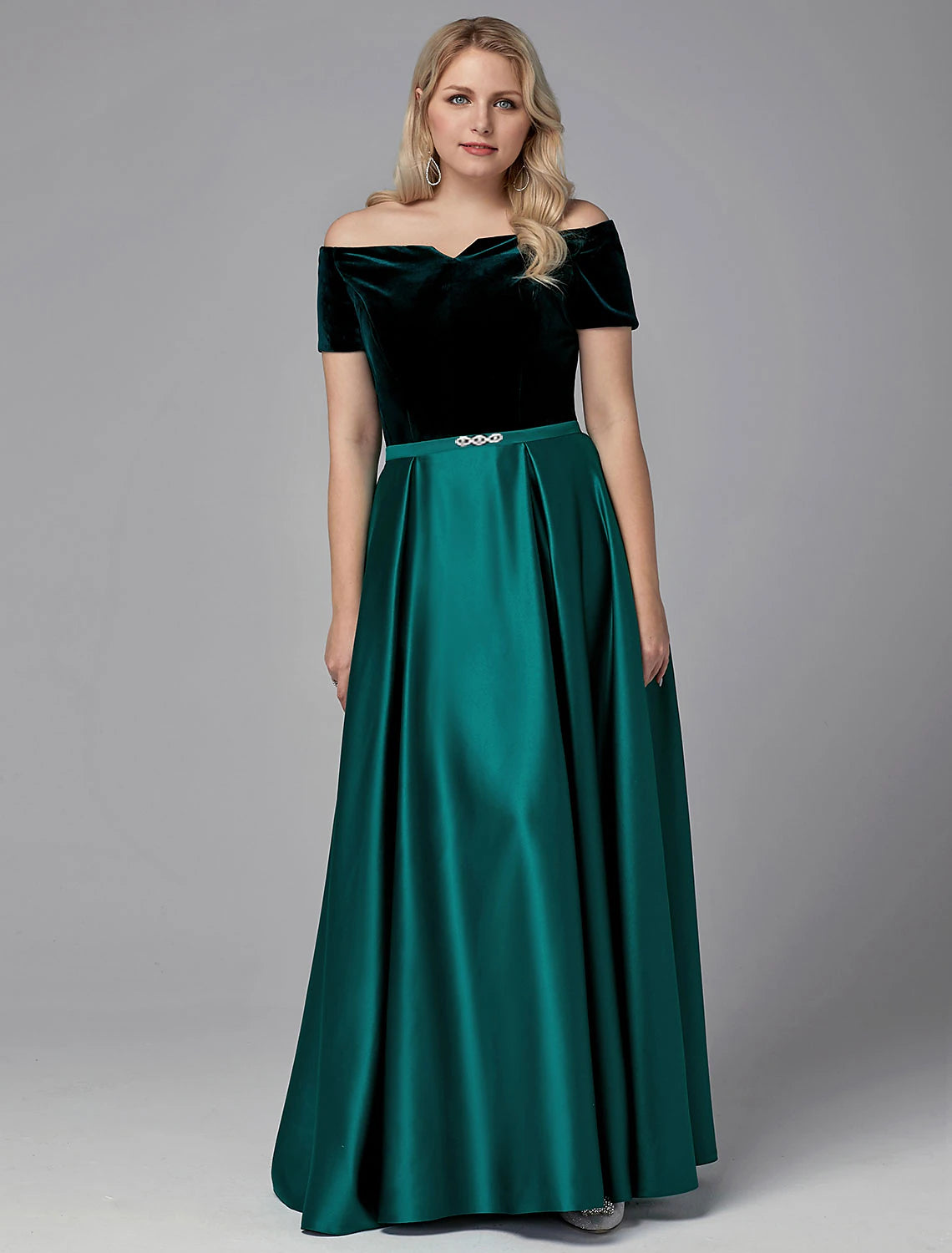 Flowing skirt of the floor-length special occasion dress.