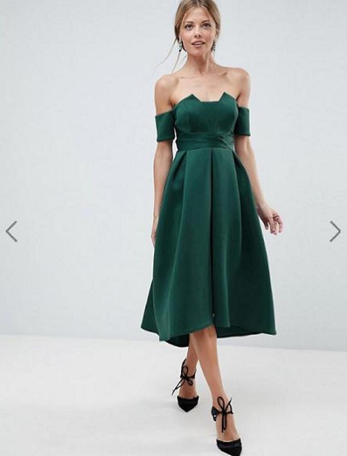 Elegant A-line bridesmaid dress in satin with off-shoulder neckline and short sleeves.