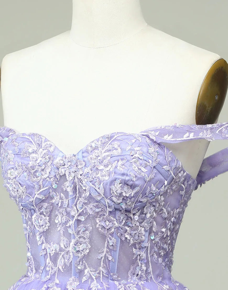 Side view of A-line off-shoulder short tulle dress with appliques.