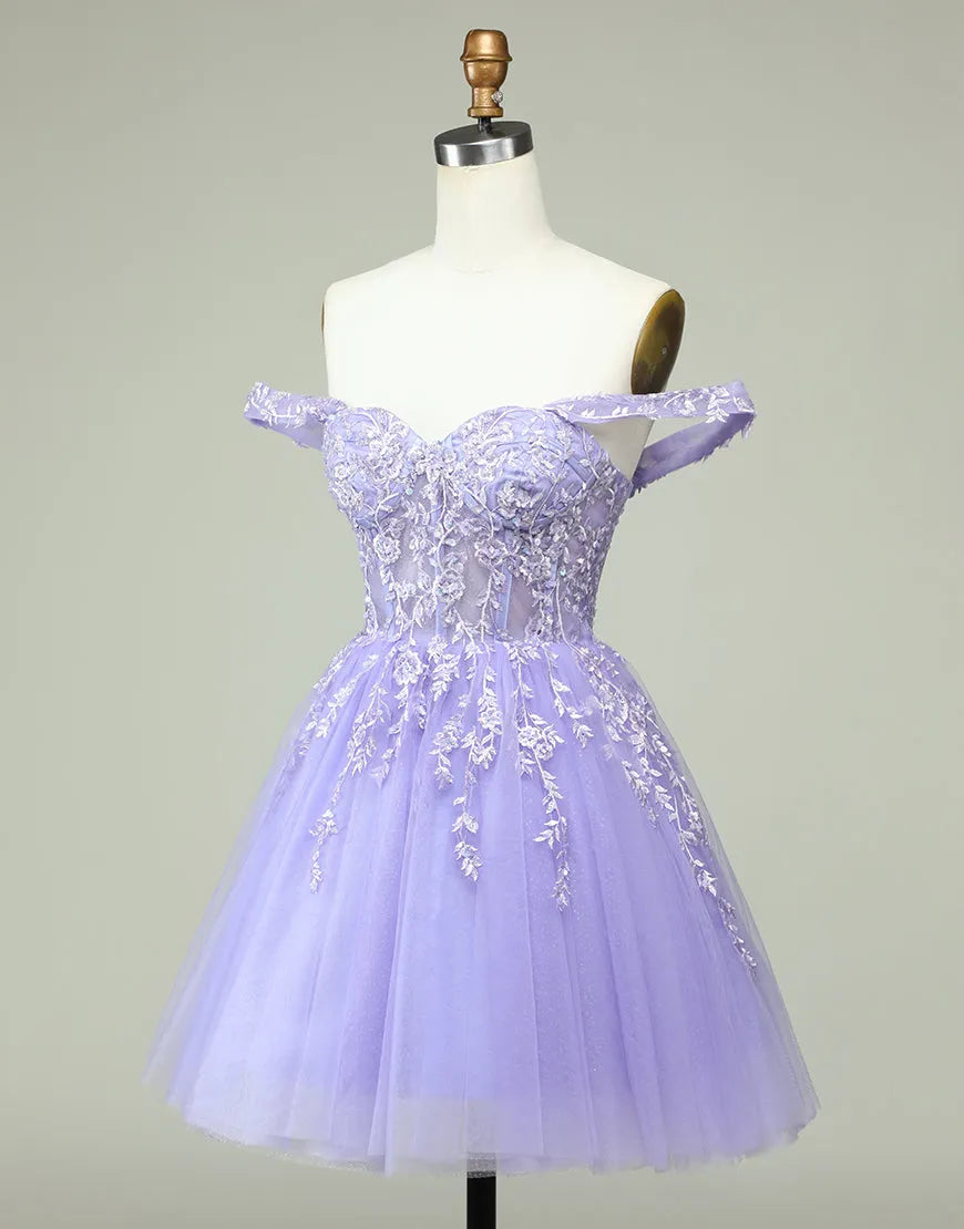 Close-up of appliques on A-line off-shoulder short tulle dress.